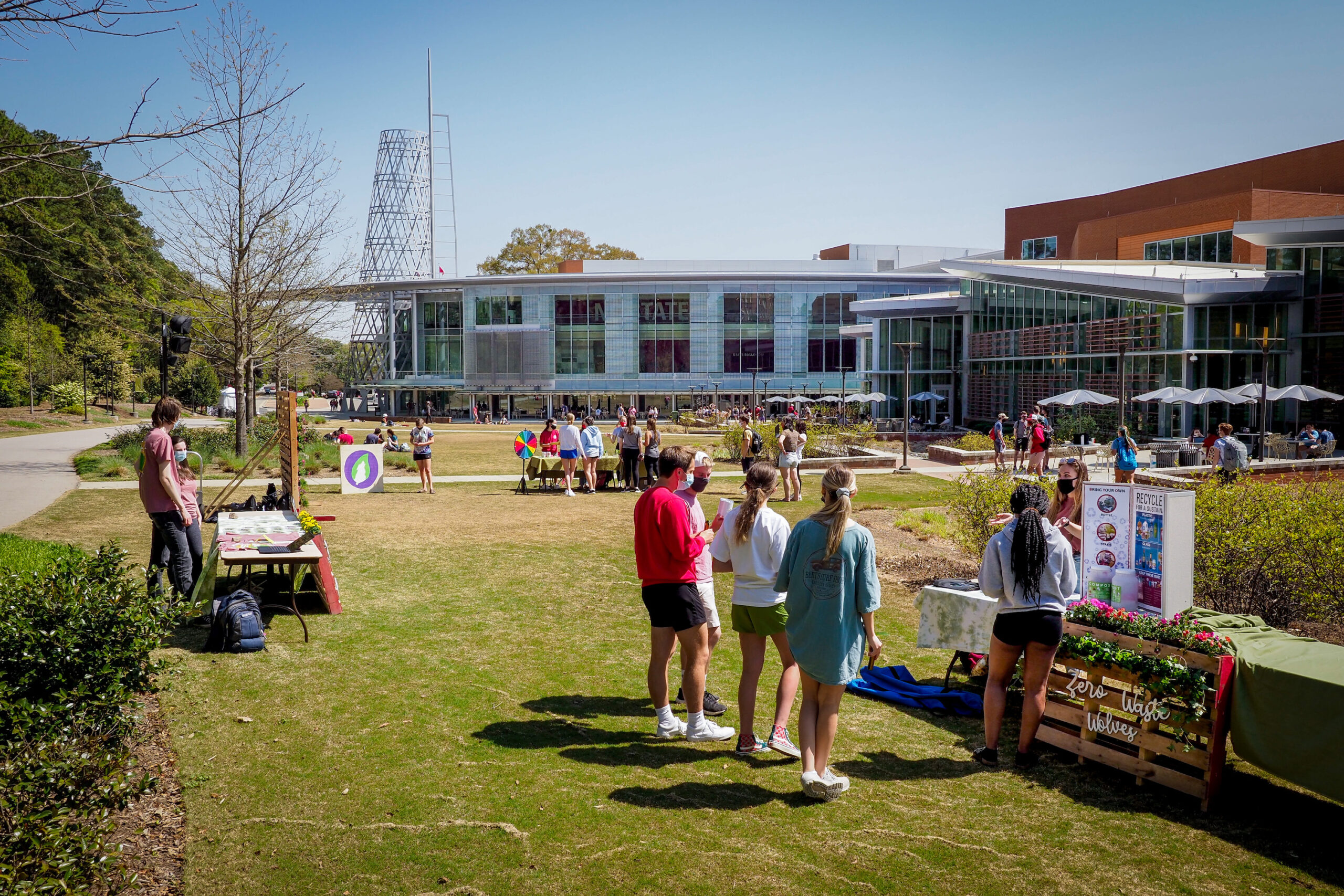 Students take advantage of springtime weather to check out some boothes promoting sustainability on Stafford Commons at the Talley Student Union. Photo by Marc Hall