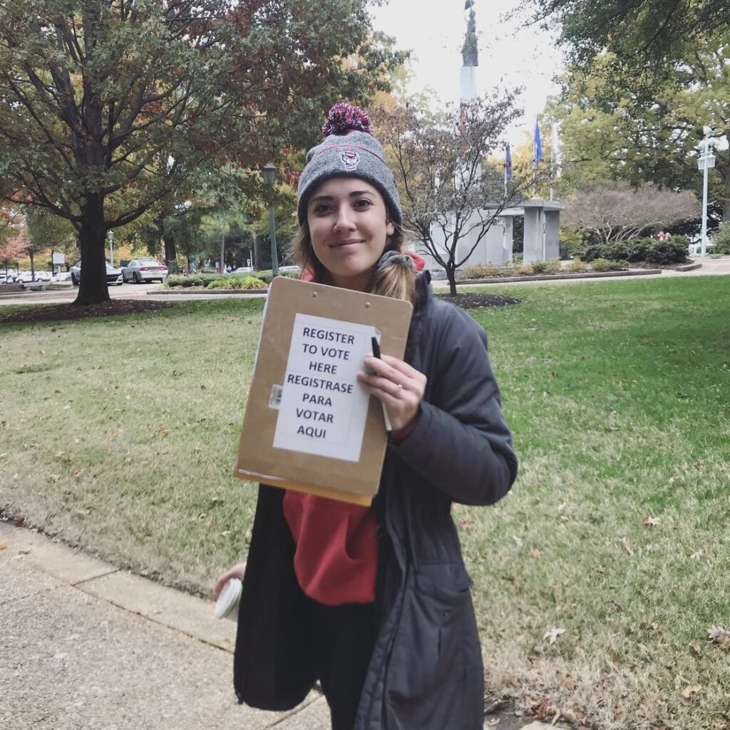 A student works with You Can Vote to talk to the public about voting laws and register individuals to vote for the upcoming election.