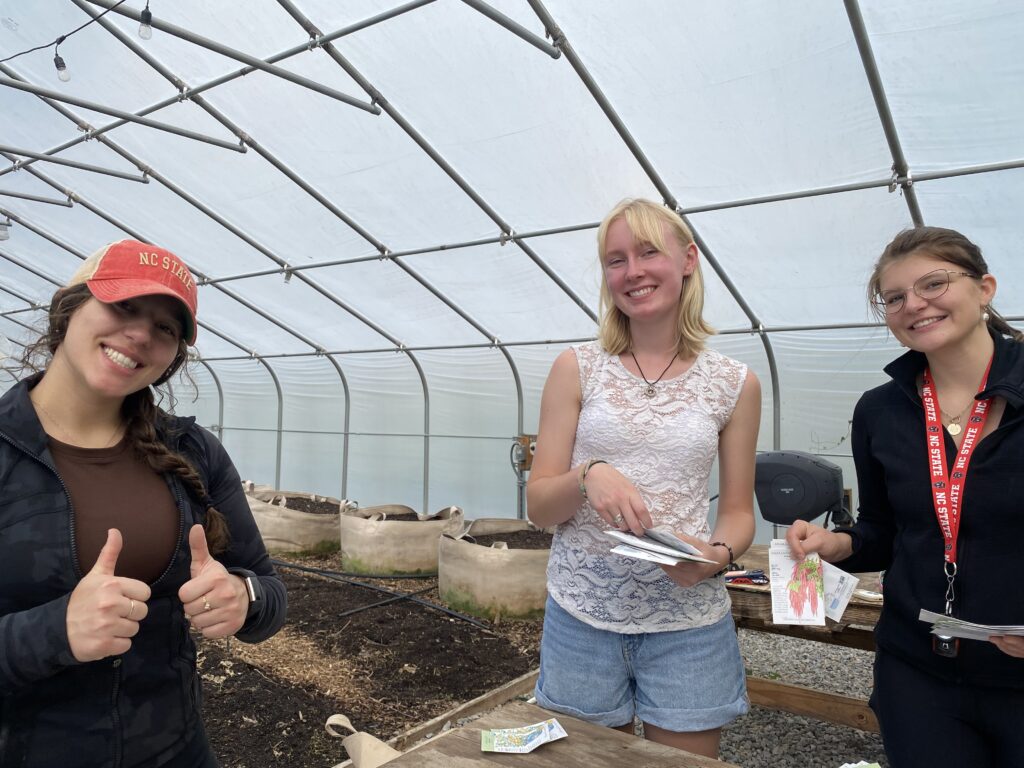 Students in our Hunger Alleviation & Food Security Community of Practice sort seed packets at Raleigh City Farm, an urban farm in downtown Raleigh.