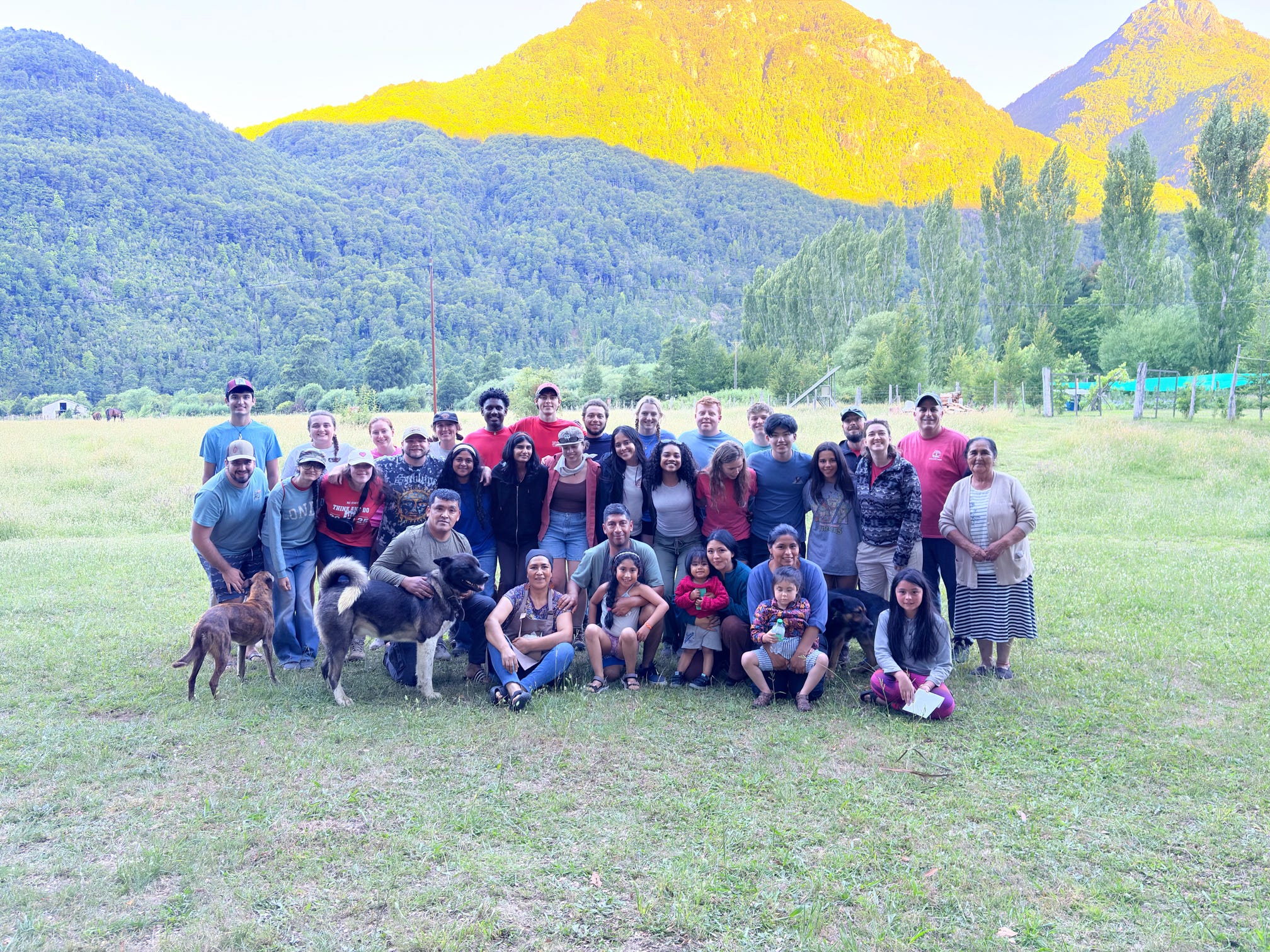 ASB Chile 2025 Team pose for a picture in front of a mountain range.