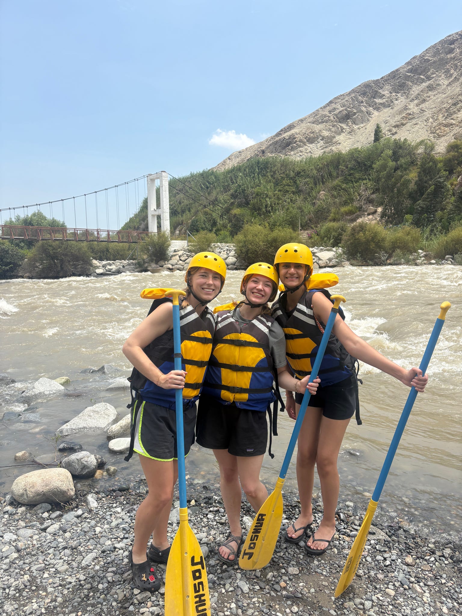 Three ASB Peru participants getting ready to whitewater raft in Peru.